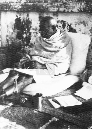 Photo for Mahatma Gandhi writing, Sevagram Ashram, 1935 blur photograph, India - Royalty Free Image