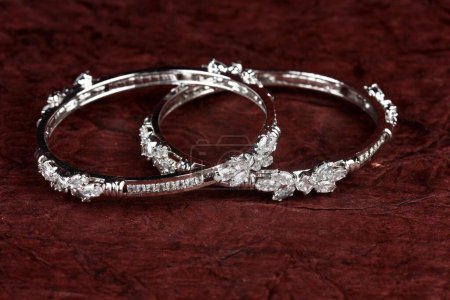 Photo for Diamond bracelet on textured background, diamond jewellery, diamond bangles, diamond jewelry - Royalty Free Image