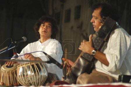 Photo for Indian classical music maestros zakir hussain tabla player with ustad sultan khan sarangi player, India - Royalty Free Image