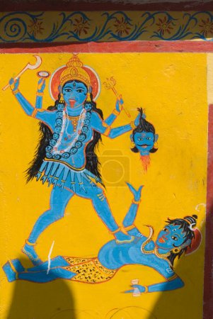 Photo for Mural depicts goddess Kali subduing Shiva in scene from Hindu mythology at Bhubaneswar ; Orissa ; India - Royalty Free Image