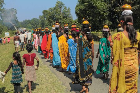 Photo for Tribal women carrying earthen pots, ceremonial procession, bastar, chhattisgarh, india, asia - Royalty Free Image