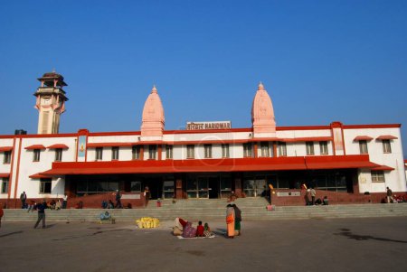 People in front of Haridwar railway station ; Haridwar ; Uttar Pradesh ; India