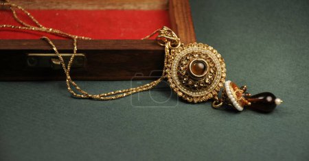 Diamond and stones pendant with gold chain with wooden box, Indian Traditional jewelry