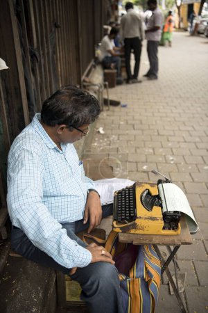 Photo for Typist sitting Pavement, Mumbai, Maharashtra, India, Asia - Royalty Free Image