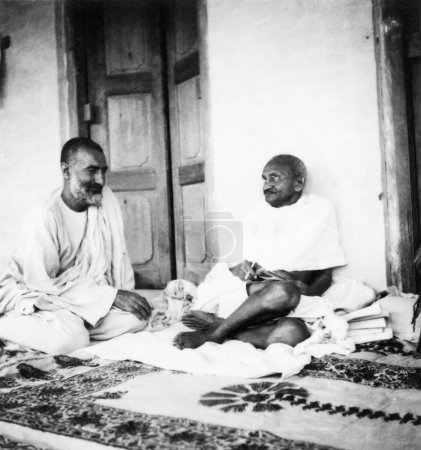 Photo for Mahatma Gandhi talking to Khan Abdul Gaffar Khan during his visit to the North West Frontier Provinces to Afghanistan , October 1938 - Royalty Free Image