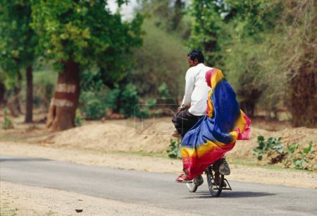 Photo for Couple traveling on cycle, pune, Maharashtra, india - Royalty Free Image