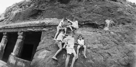 Photo for A group of boys on a wall at karla caves ; Bombay now Mumbai ; Maharashtra ; India - Royalty Free Image