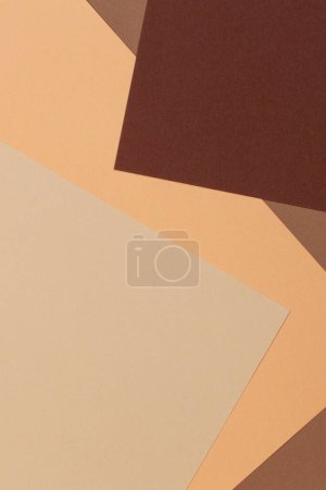 Color papers geometry composition background with beige yellow and brown tones
