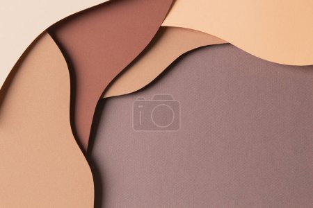 Photo for Abstract colored paper texture background. Minimal paper cut style composition with layers of geometric shapes and lines in shades of beige and brown colors. Top view, copy space - Royalty Free Image