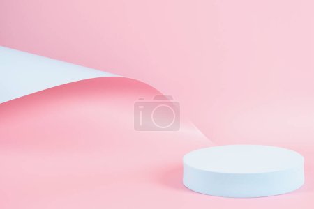 Photo for Abstract trendy composition with empty round podium platform for product or cosmetics presentation on pastel pink and light blue background. Trendy modern curved shaped lines. Front view. - Royalty Free Image