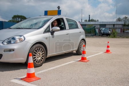 Driving school or test. Training parking.  How to drive and park car between cones.