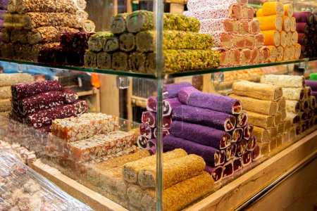 Traditional Turkish locum with nougat, nuts and fruits. Sweets and traditional oriental delights concept. Street market, Istanbul, Turkey