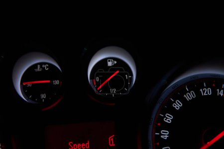 Car speedometer - auto Dashboard with low fuel gauge