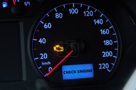 Check engine error light illuminated on car dashboard