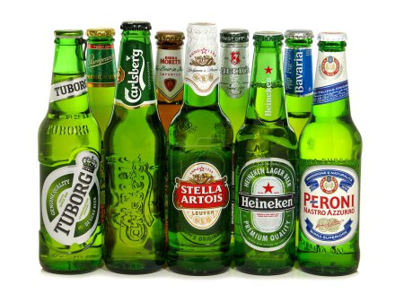 Photo for BUCHAREST, ROMANIA - JANUARY 12, 2016. Various brands of popular beer produced in Europe, including Carlsberg, Stella Artois, Heineken, Peroni, Tuborg, Beks, Moretti, Bavaria and Staropramen - Royalty Free Image