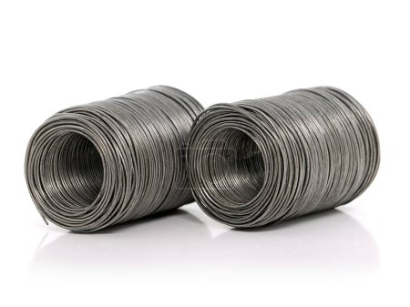Roll of metal wire isolated on white, metallurgical industry
