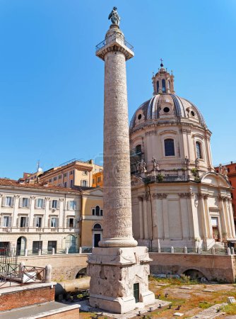 Trajan's Column and Santa Maria di Loreto church on the background in Rome, Italy.