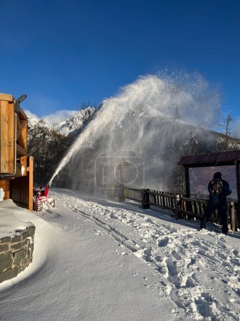 Snow cleaning with a large snow blower in the high tatras Slovak