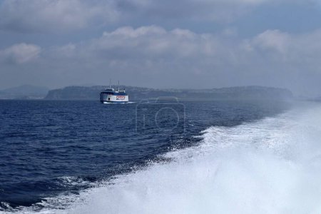 Photo for Procida, Campania, Italy - May 12, 2022: Gestour ferry in the Gulf of Naples near the island of Procida from the hydrofoil - Royalty Free Image