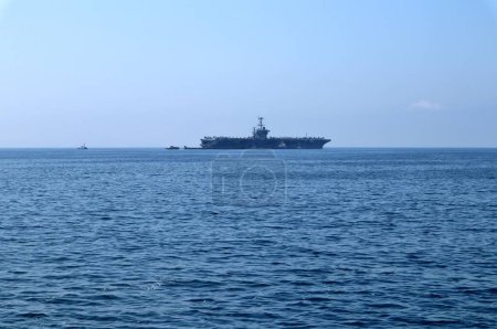 Photo for Naples, Campania, Italy - May 12, 2022: Truman aircraft carrier in the Gulf of Naples seen from the hydrofoil bound for Ischia - Royalty Free Image