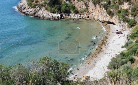Photo for Gaeta, Lazio, Italy  September 5, 2021: Flacca Antica beach on the Itri coast from the mid-coast path that connects the Piana di Sant'Agostino with the Baia delle Sirene - Royalty Free Image
