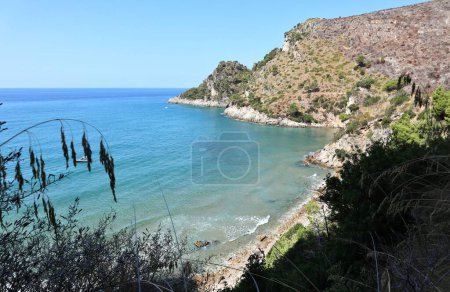 Photo for Gaeta, Lazio, Italy  September 5, 2021: Spiaggia delle follece on the coast of Itri from the mid-coast path that connects the Piana di Sant'Agostino with the Baia delle Sirene - Royalty Free Image