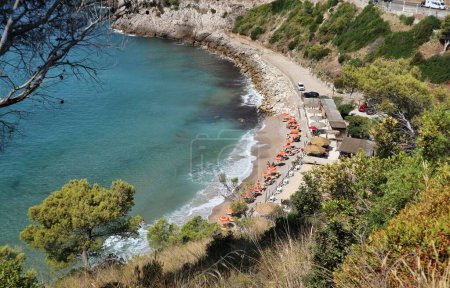 Photo for Sperlonga, Lazio, Italy  September 5, 2021: Lido El Sombrero beach from the mid-coast path that connects the Piana di Sant'Agostino with the Baia delle Sirene - Royalty Free Image