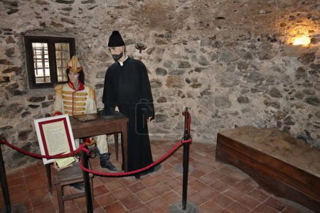 Photo for Pizzo Calabro, Calabria, Italy  June 10, 2021: Confession of the King of Naples Gioacchino Murat with the canon Masdea before the shooting - Royalty Free Image