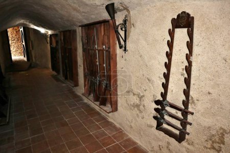 Photo for Pizzo Calabro, Calabria, Italy  June 10, 2021: Weapons on display in the prison of the 15th century Castello Murat - Royalty Free Image