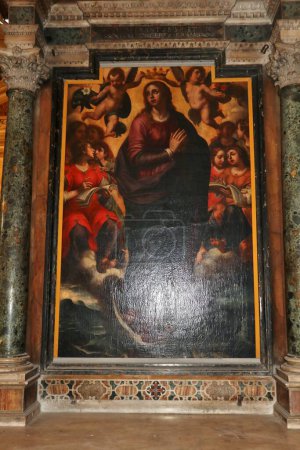 Photo for Naples, Campania, Italy - December 27, 2022: Aedicule of the Immaculata with seventeenth-century painting by Ippolito Borghese between the first and second right chapels of the Church of Santa Maria La Nova - Royalty Free Image