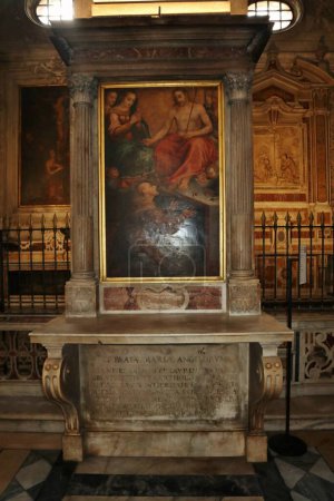 Photo for Naples, Campania, Italy - December 27, 2022: Edicule of Santa Maria degli Angeli with seventeenth-century painting of Christ, the Virgin and Saint Francis by Marco Mele between the second and third right chapels of the Church of Santa Maria La Nova - Royalty Free Image