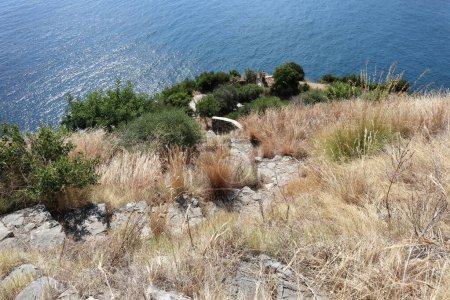 Photo for Massa Lubrense, Campania, Italy - September 5, 2023: Panorama of the coast from the Scala dei 700 steps of the path that connects the village of Torca with the Crapolla Fjord - Royalty Free Image