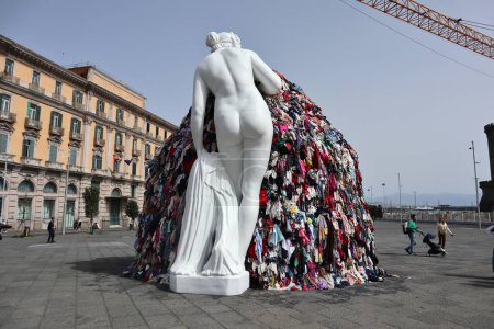 Photo for Naples, Campania, Italy  30 March 2024: The new Venus of Rags by Michelangelo Pistoletto, rebuilt after the vandalism fire of 12 July 2023, relocated to Piazza Municipio on 6 March 2024 - Royalty Free Image