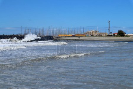 Lido di Ostia, Lazio, Italy - May 3, 2024: Lungomare Duca degli Abruzzi beach with rough sea