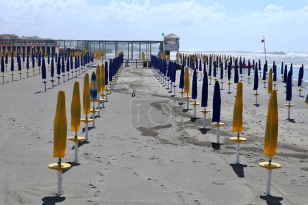Lido di Ostia, Lazio, Italy - May 3, 2024: Lungomare Toscanelli beach with rough sea