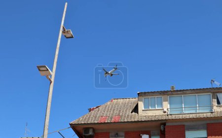 Photo for Lido di Ostia - Aereo Vueling in fase di atterraggio all'Aeroporto di Fiumicino - Royalty Free Image