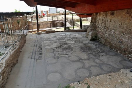 Vasto, Abruzzo, Italy - May 29, 2024: Remains of the Roman baths of ancient Histonium dating back to the 2nd century AD still buried under Via Adriatica and under the church of Sant'Antonio di Padova
