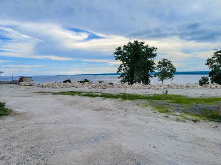 Lakeside Serenity Amidst Construction Debris - Contrasting Harmony