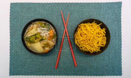 Yakissoba in lunchbox and bowl with Chique Hashi