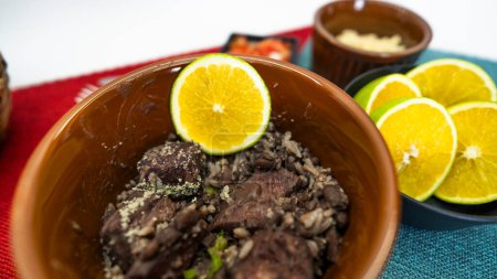 Beans, salad and food complements in this traditional Brazilian dish