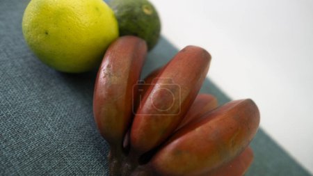 Photo for Red banana, orange, lemon, avocado fruit present in a large part of the Brazilian territory - Royalty Free Image