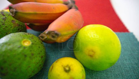 Photo for Red banana, orange, lemon, avocado fruit present in a large part of the Brazilian territory - Royalty Free Image