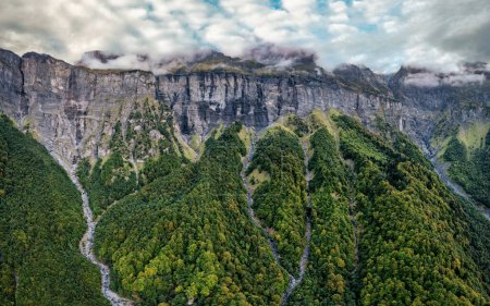 Photo for Majestic landscape of Giffre valley of mountain range with cascade in French Alps at Sixt Fer a Cheval, France - Royalty Free Image