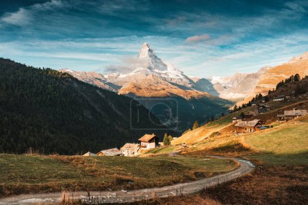 Beautiful landscape of Matterhorn iconic mountain and rustic village on hill in Findeln, Switzerland