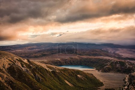 Viewpoint of sunset over Tama Lakes with Mount Ruapehu hiding in the cloud at Tongariro national park, North island of New Zealand