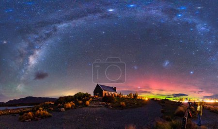 Fantastic nightscape of Milky Way, Nebula, Aurora Australis glowing over Church of the Good Shepherd at Lake Tekapo, New Zealand
