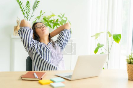 Photo for Asia woman touching massage stiff neck after sedentary computer work in incorrect posture, overworking for  long time,  exercises to relieve pain in muscles, Office syndrome concept, Copy space - Royalty Free Image