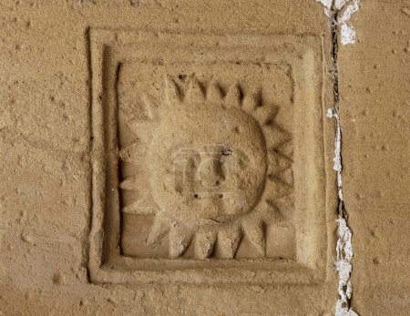 Shot in color detail on the facade of this historic building representing some character, animal or flower. Set at San Vicente de la Sonsierra, Logroo, La Rioja, Spain, Europe