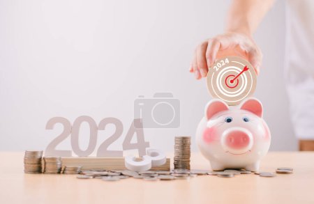 Target Goal challenge concept. Businessman saving money in piggy bank achievement. 2024 seo marketing action strategy, Resolution, Goal, Money plan, Retirement fund, Pension, Investment Financia