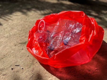Plastic bottle waste scattered around pollutes the environment